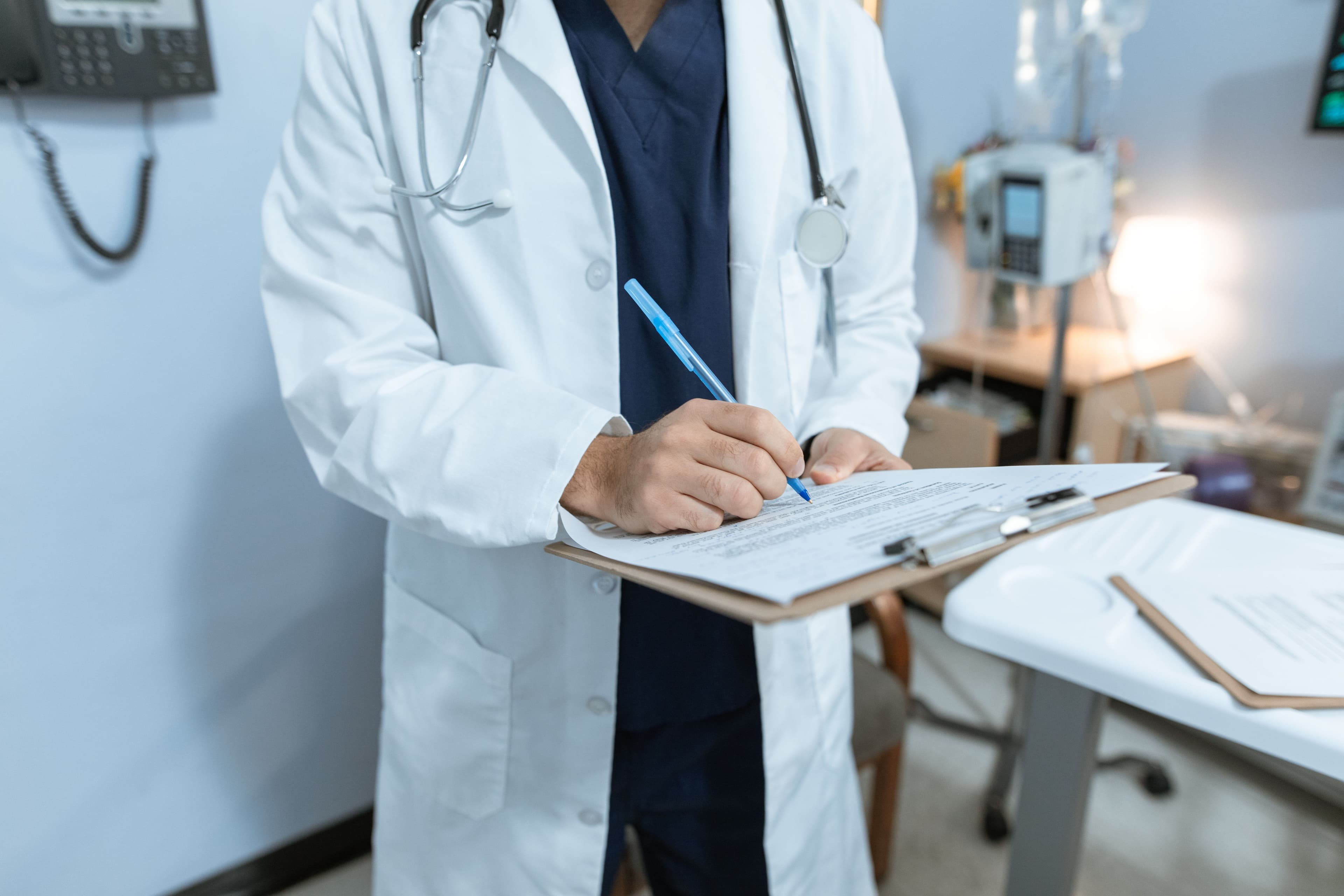Doctor writing prescription
