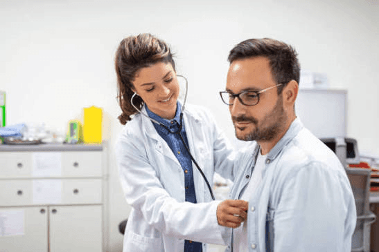 Doctor examining patient